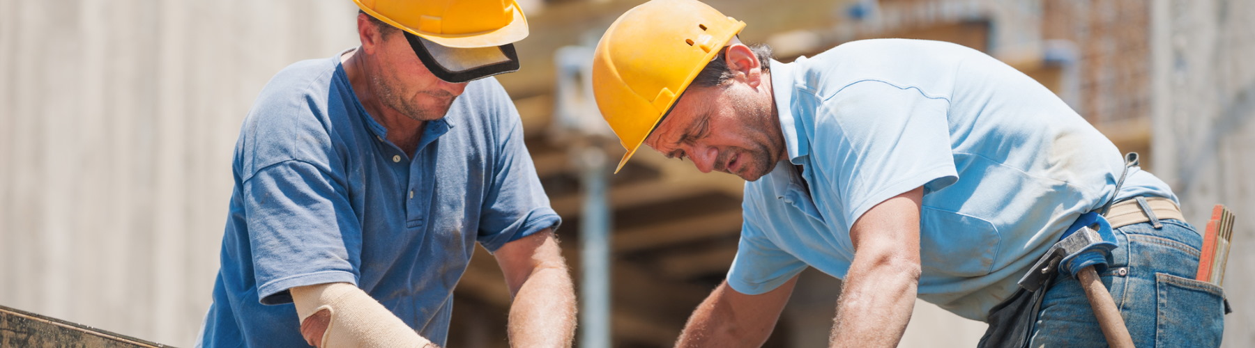 two construction workers on job site